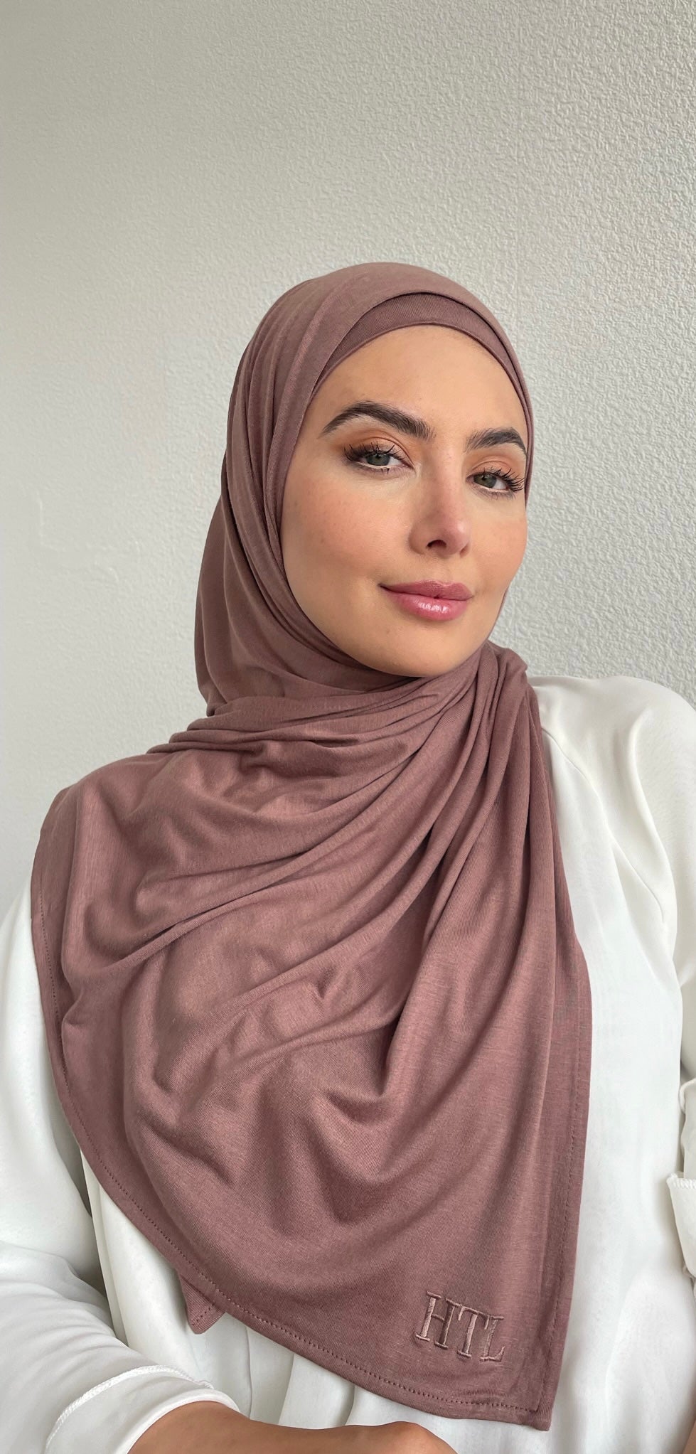 Luxury modest clothing brand. Muslim women wearing matching hijab set from hayaa the label ltd.