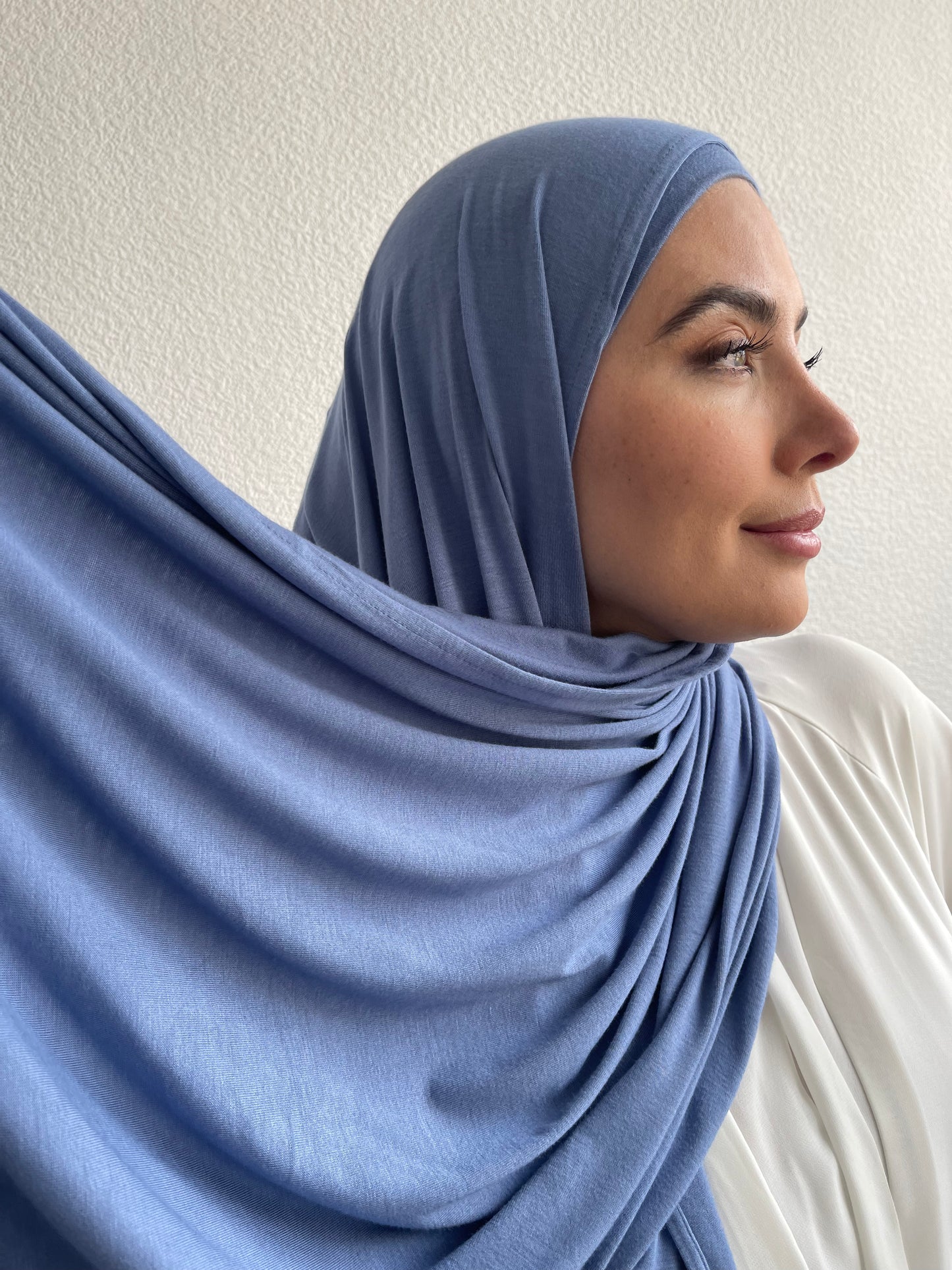 Premium jersey hijabs with matching under caps. Muslim women wearing luxury hijab from hayaa the label ltd.