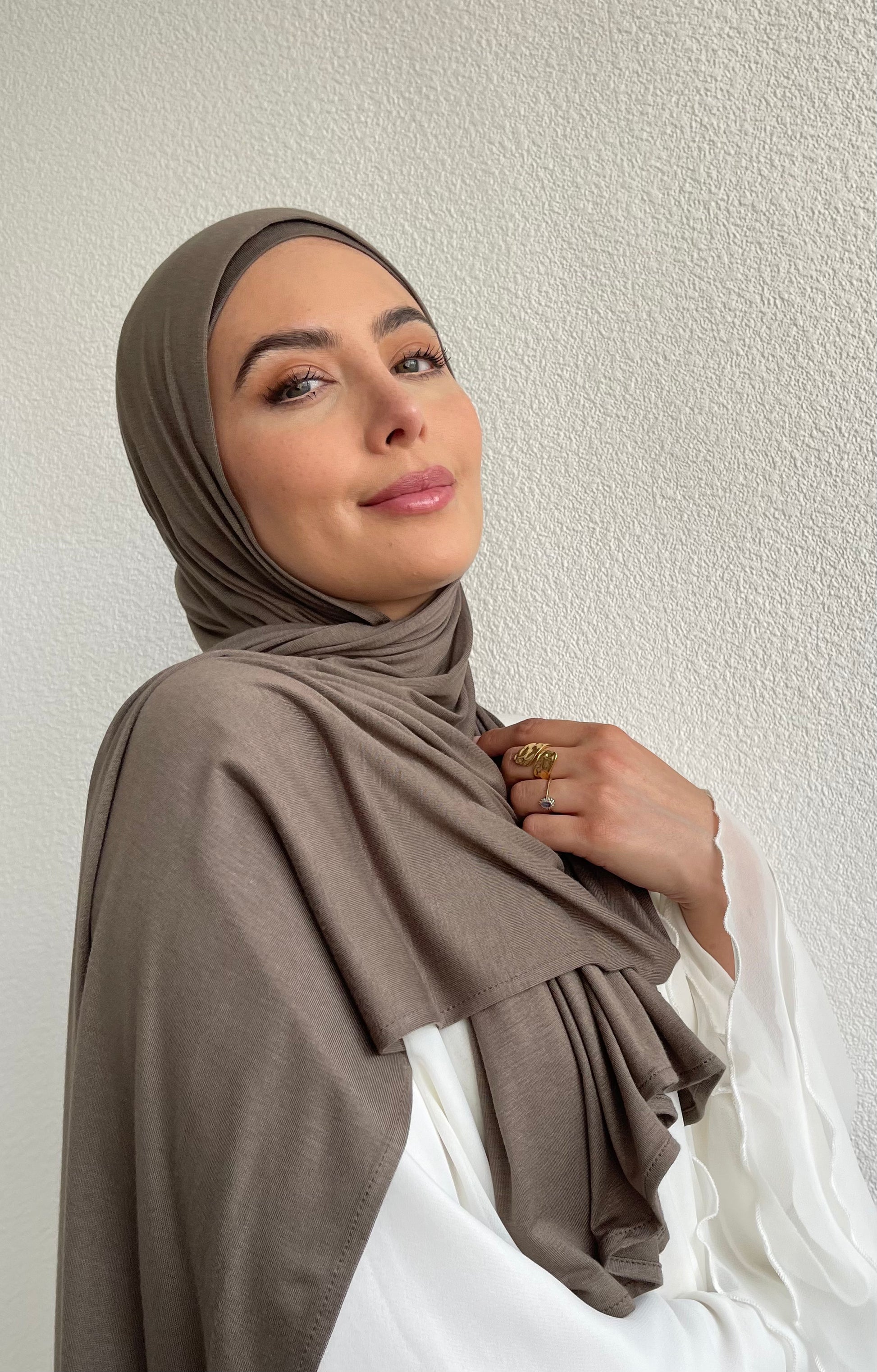 Muslimah covered in luxury hijab. Cotton jersey hijab sets UK with next day shipping.