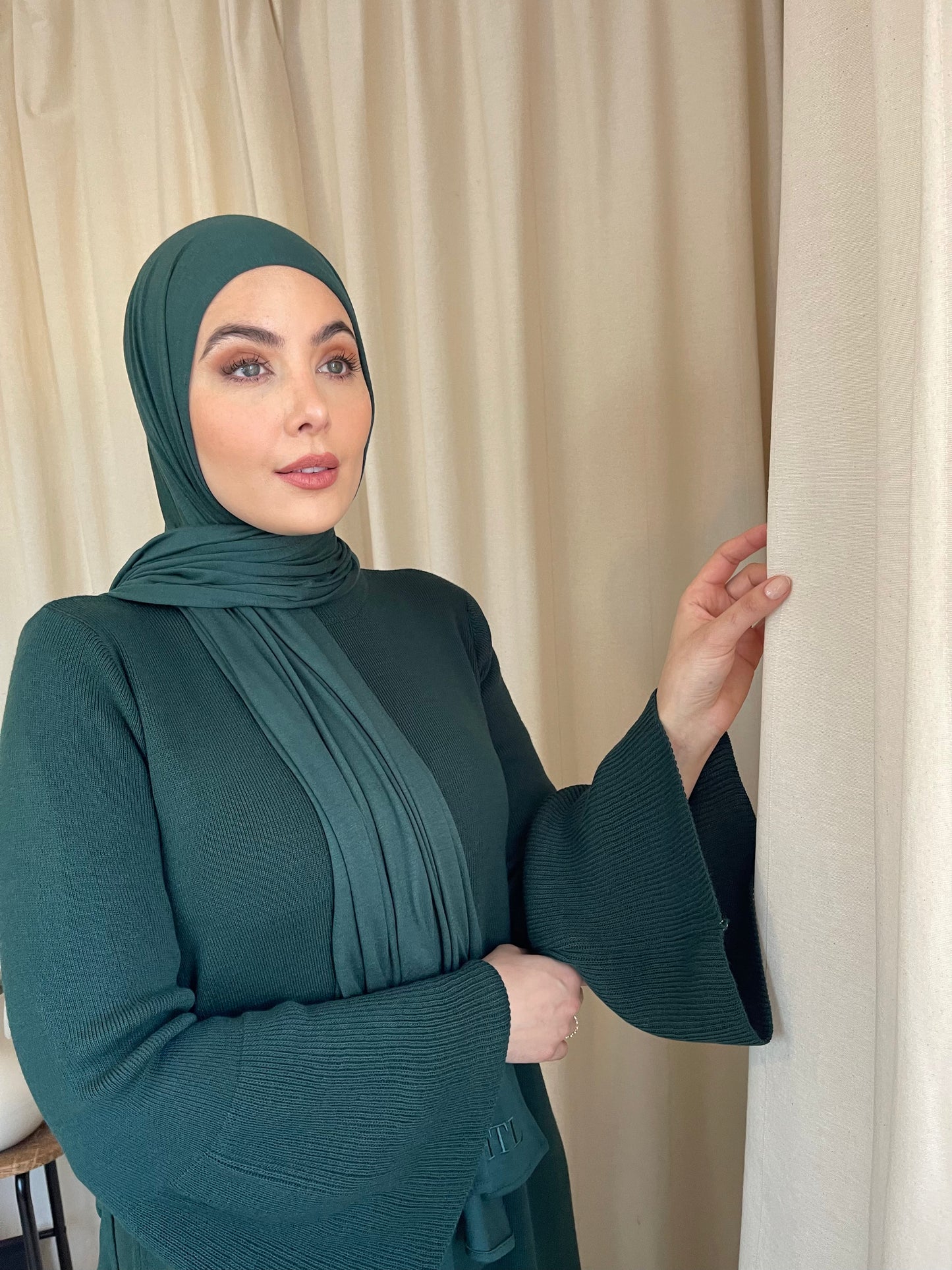 Luxury modest clothing brands. Muslim women wearing matching abaya sets from hayaa the label ltd.