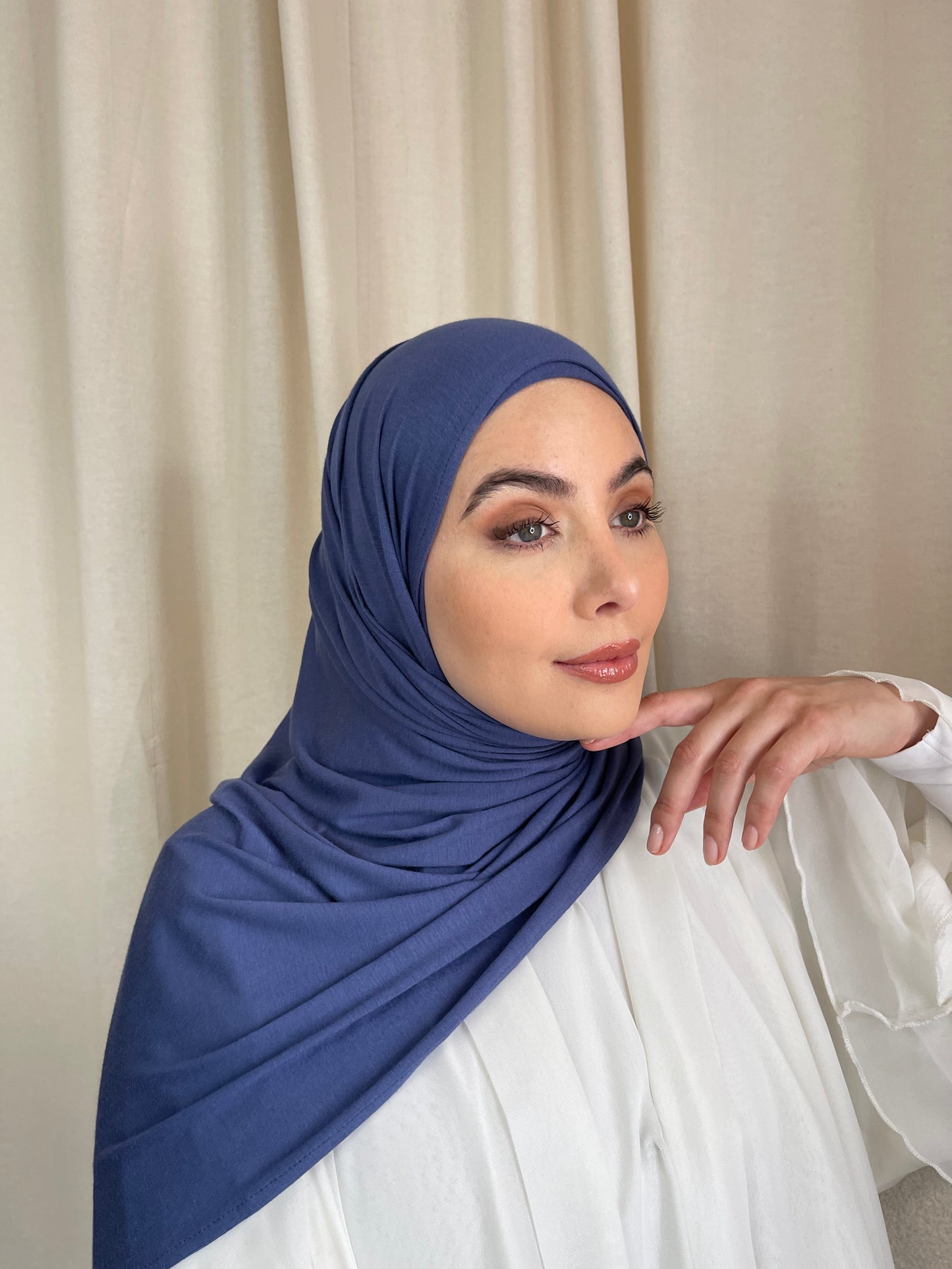 Muslimah covered in luxury hijab. Cotton jersey hijab sets UK. Abaya stores UK