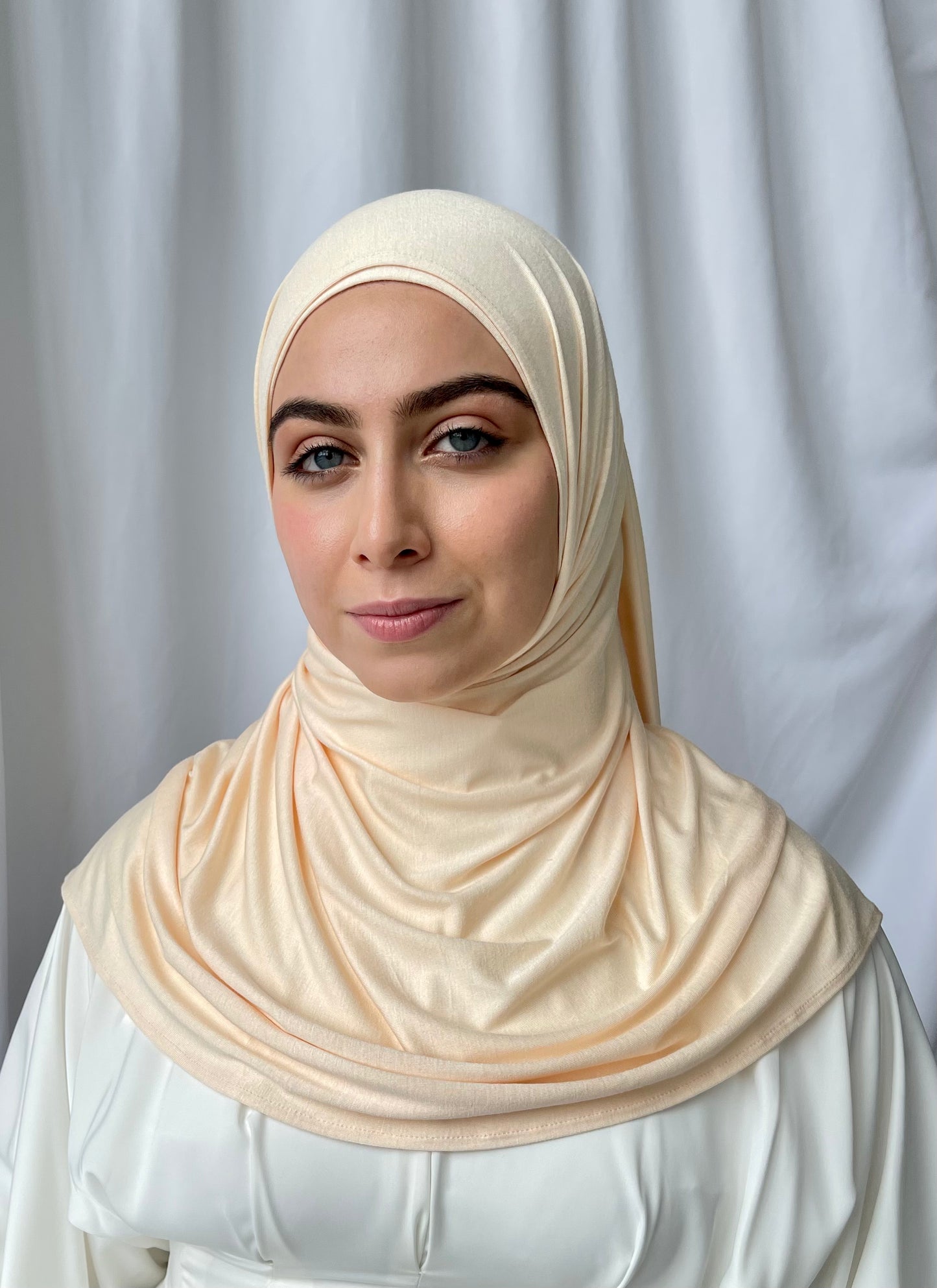 Modest islamic clothing brand for women. Luxury apricot maxi jersey hijab.