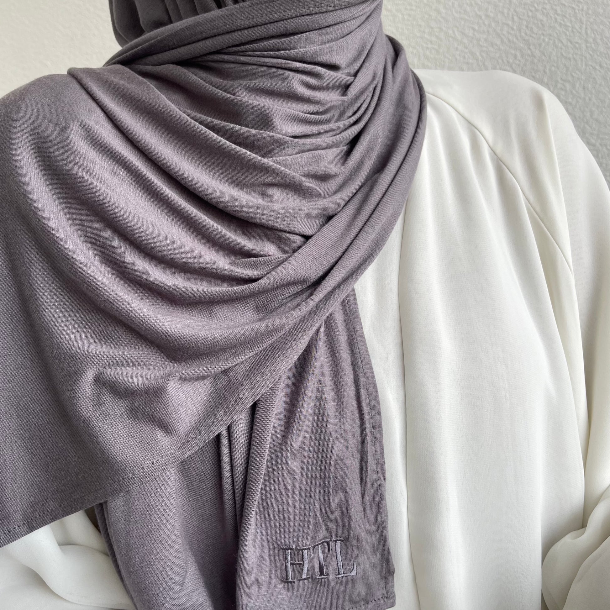 Premium jersey hijabs with matching under caps. Muslim women wearing luxury hijab from hayaa the label ltd. 