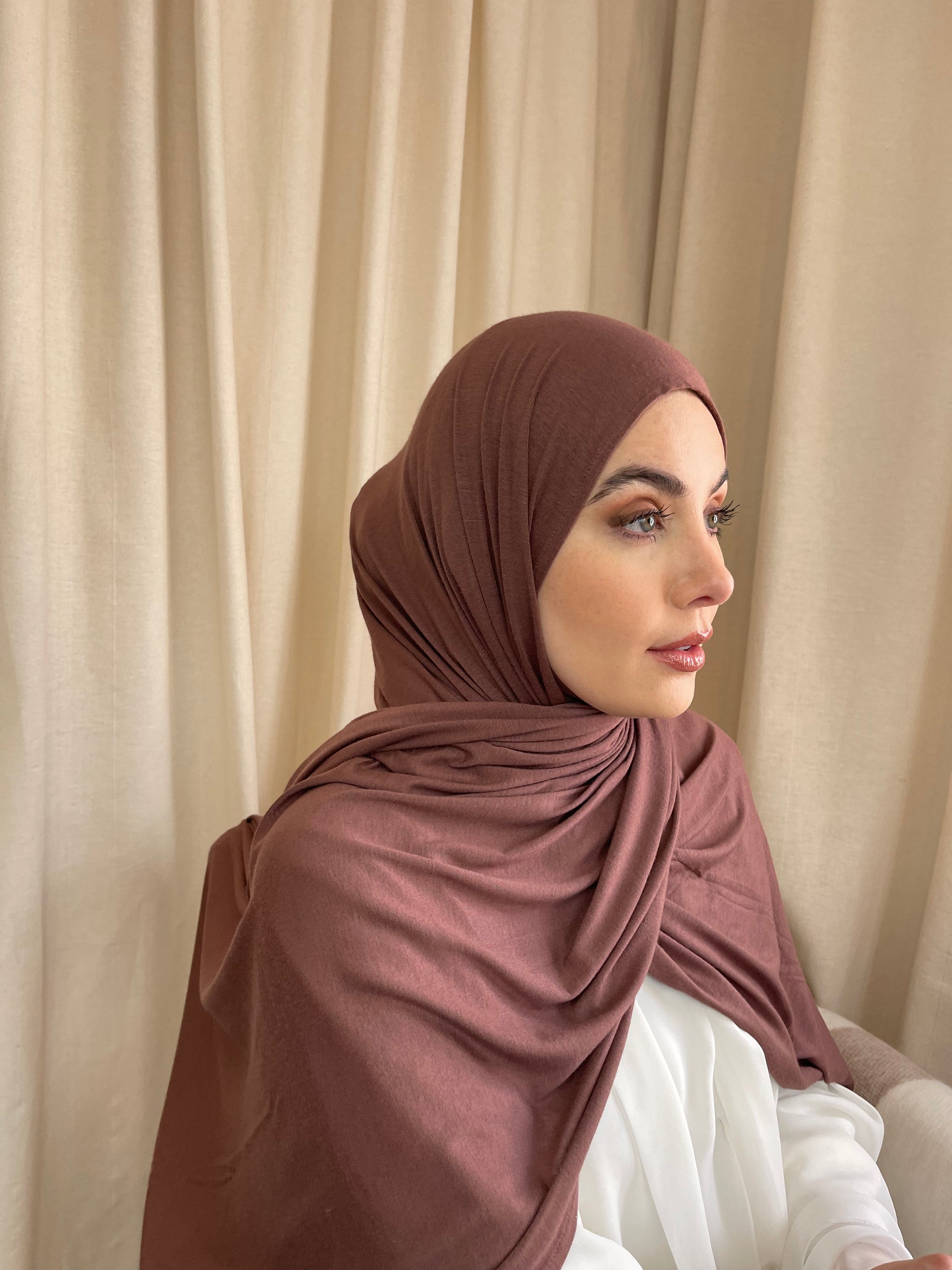 Muslim women wearing full coverage jersey hijab style. hijabs for sale online.