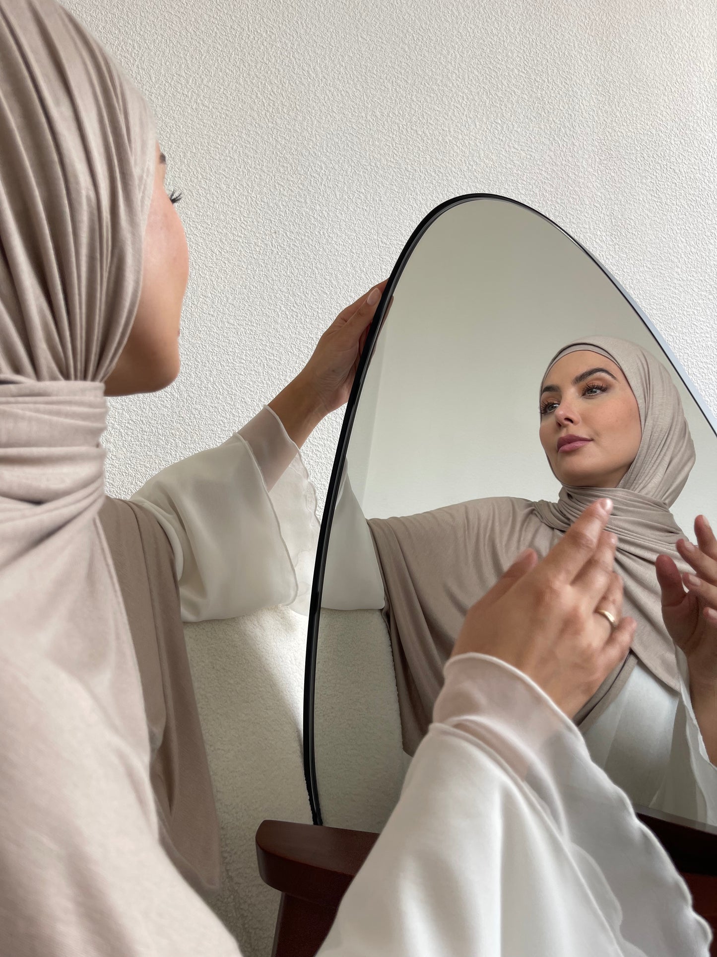 Hijabi woman wearing soft breathable jersey hijabs. Double stitched jersey hijabs from hayaa the label ltd