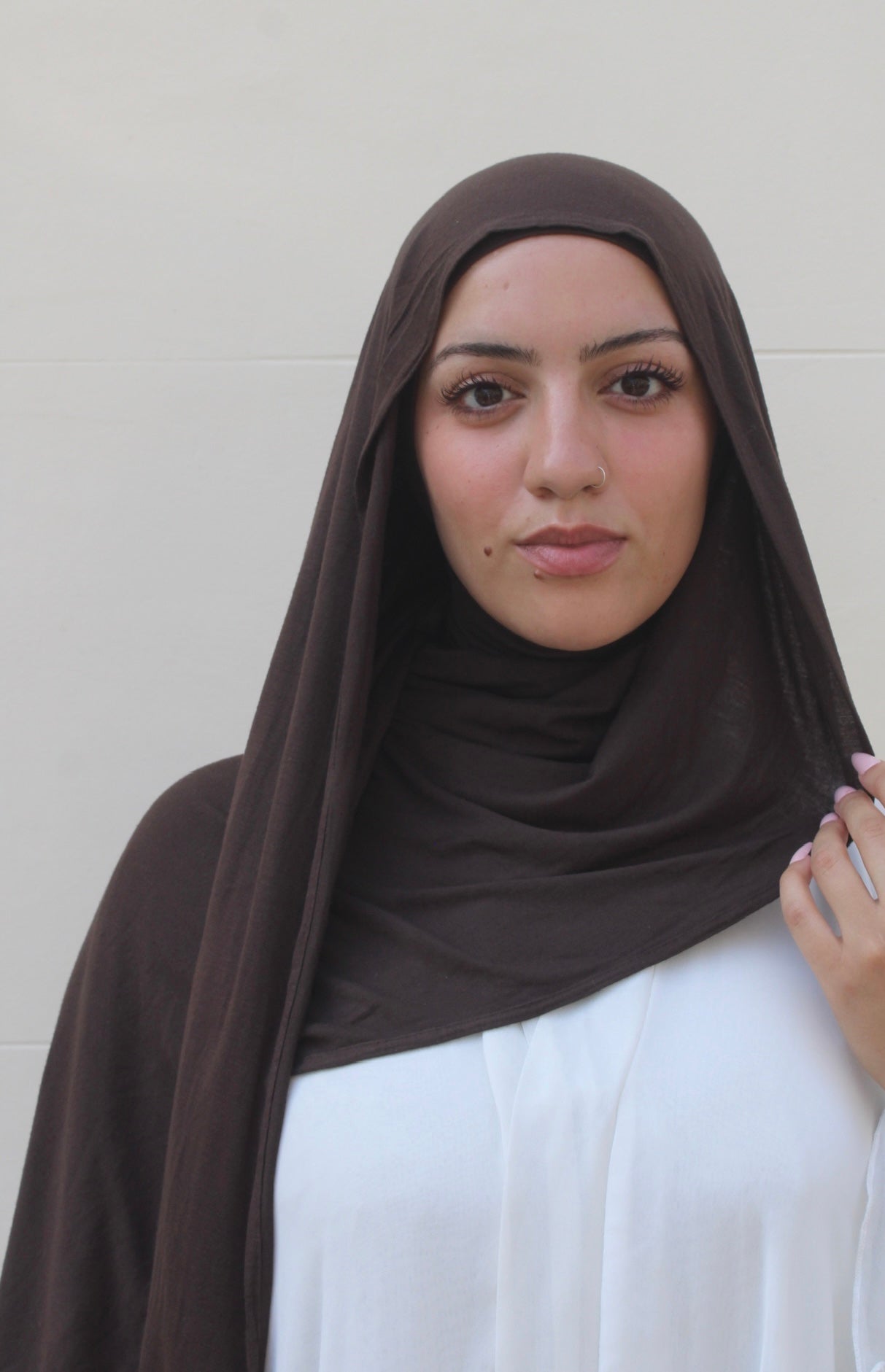 Woman muslim modest wearing a brown hijab from the best hijabs in the uk hayaa th label in the colour espresso brown